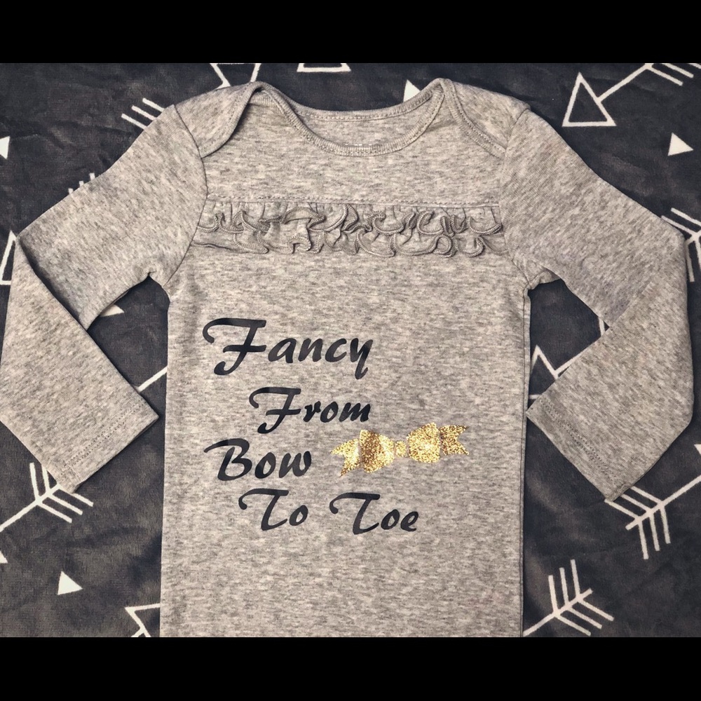 Fancy from bow to toe onesie